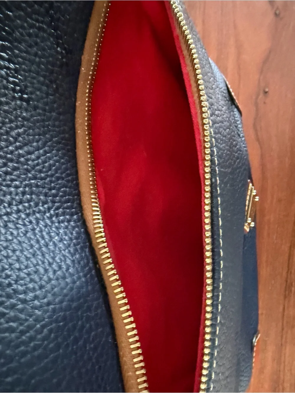 Dooney & Bourke Black Pebbled Leather Crossbody with Brown Trim & Gold Plate